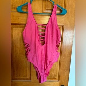 Swim suit with cut sides